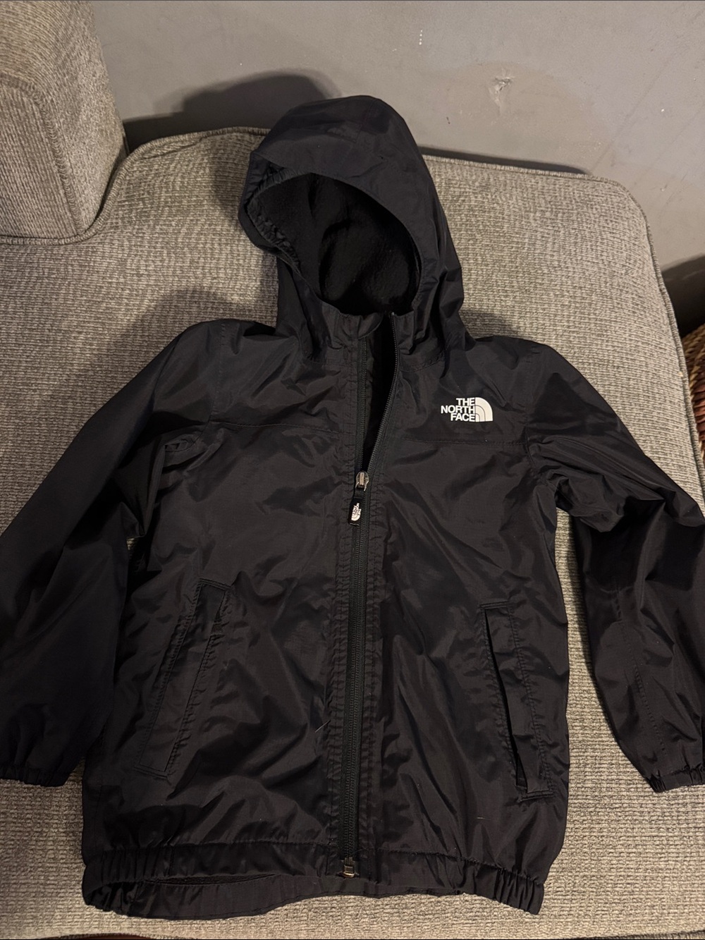 The North Face Kids Black Hooded Raincoat with Logo